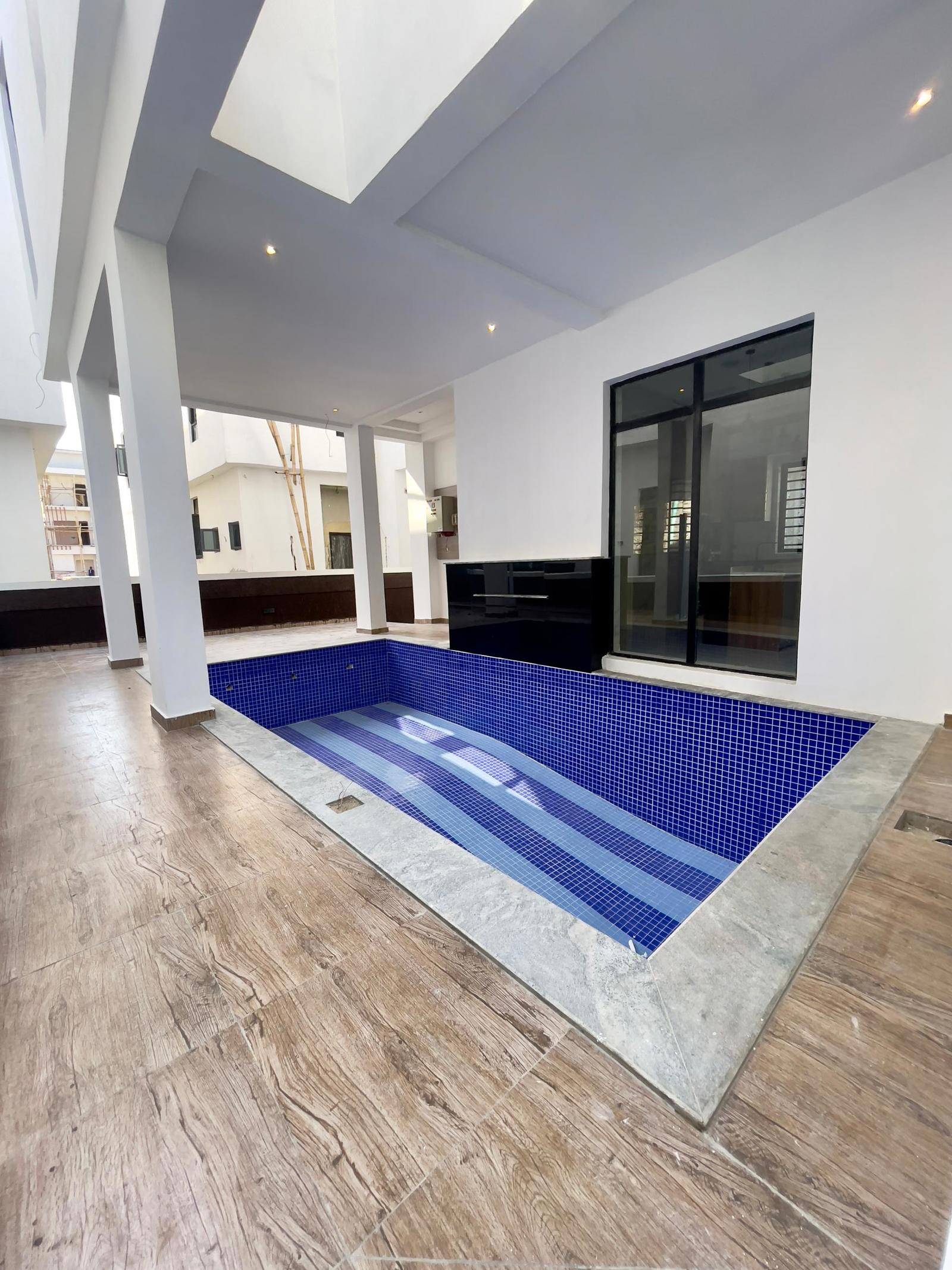 GRACEFULLY CARVED 5 BED LUXURY SMART HOME WITH SWIMMING POOL AND BQ